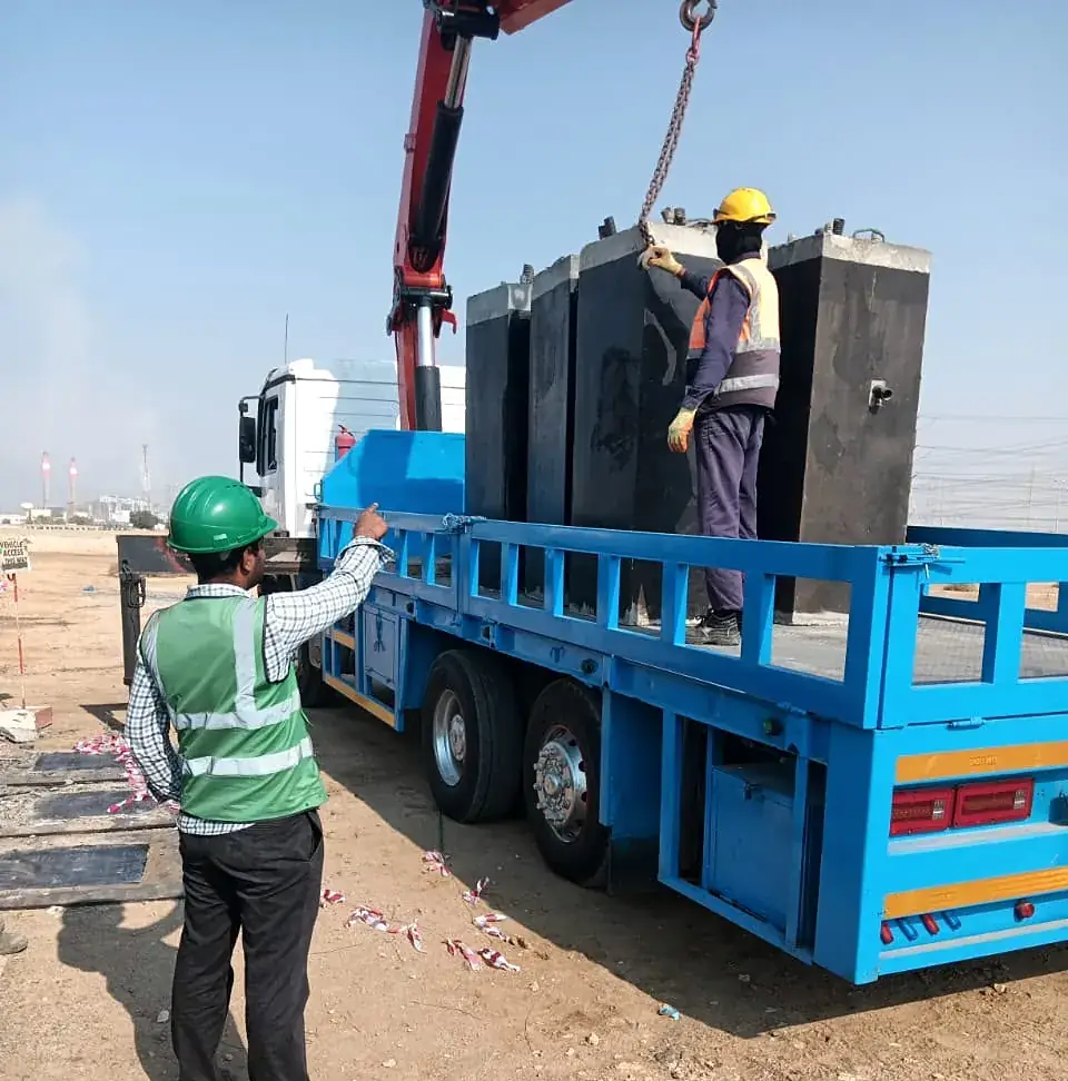 Precast chambers delivered by boom truck